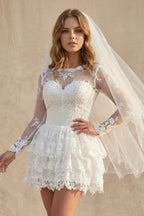 Robe de mariée courte ivoire en dentelle à manches longues dos nu - Harana