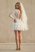 Robe de mariée courte ivoire en dentelle à manches longues dos nu - Harana