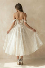 Robe de mariée ivoire trapèze en dentelle décolleté cœur sans manches - Harana