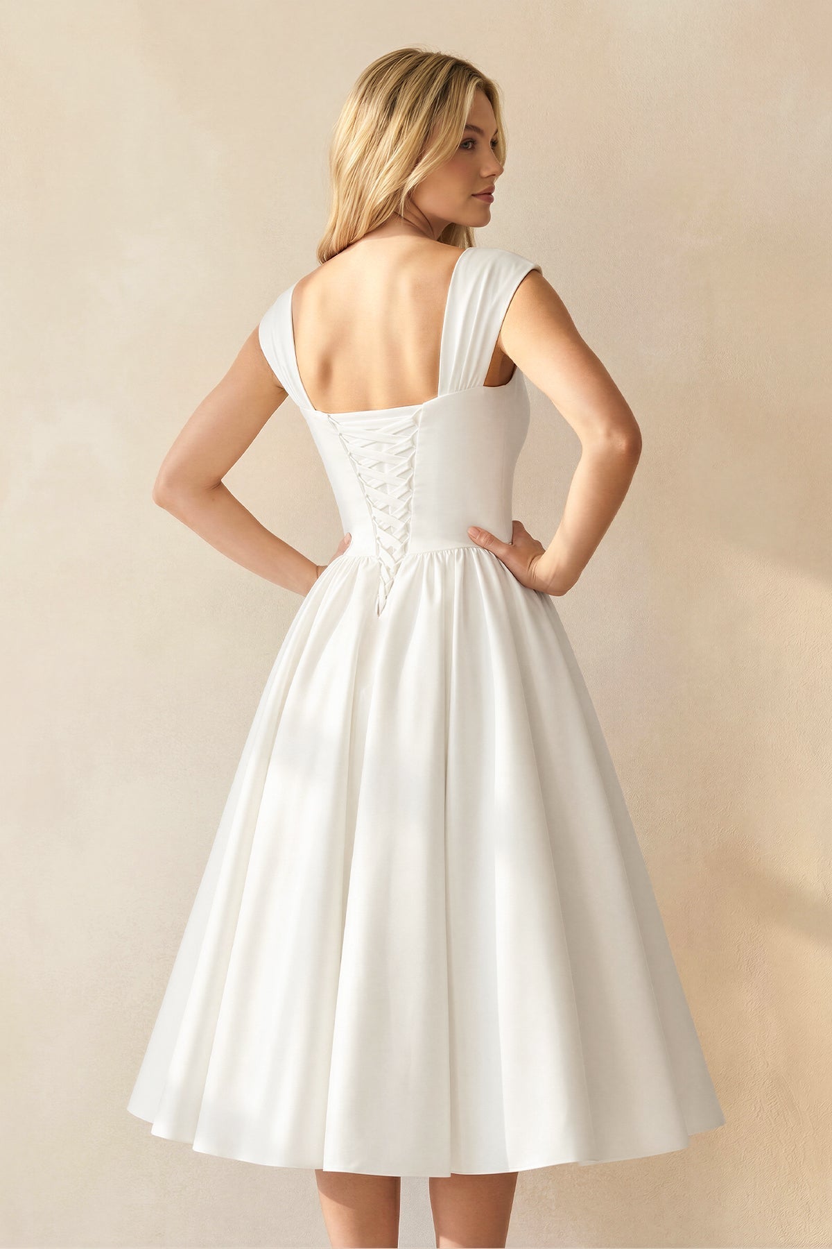 Robe de mariée ivoire trapèze en satin sans manches à corset - Harana