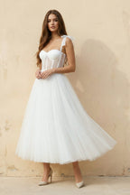 Robe de mariée blanche trapèze en tulle à fines bretelles sans manches - Harana