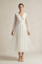 Robe de mariée ivoire trapèze tulle col V manches longues - Harana