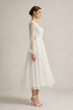Robe de mariée ivoire trapèze tulle col V manches longues - Harana
