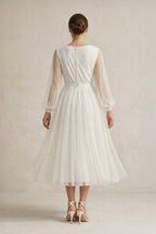 Robe de mariée ivoire trapèze tulle col V manches longues - Harana