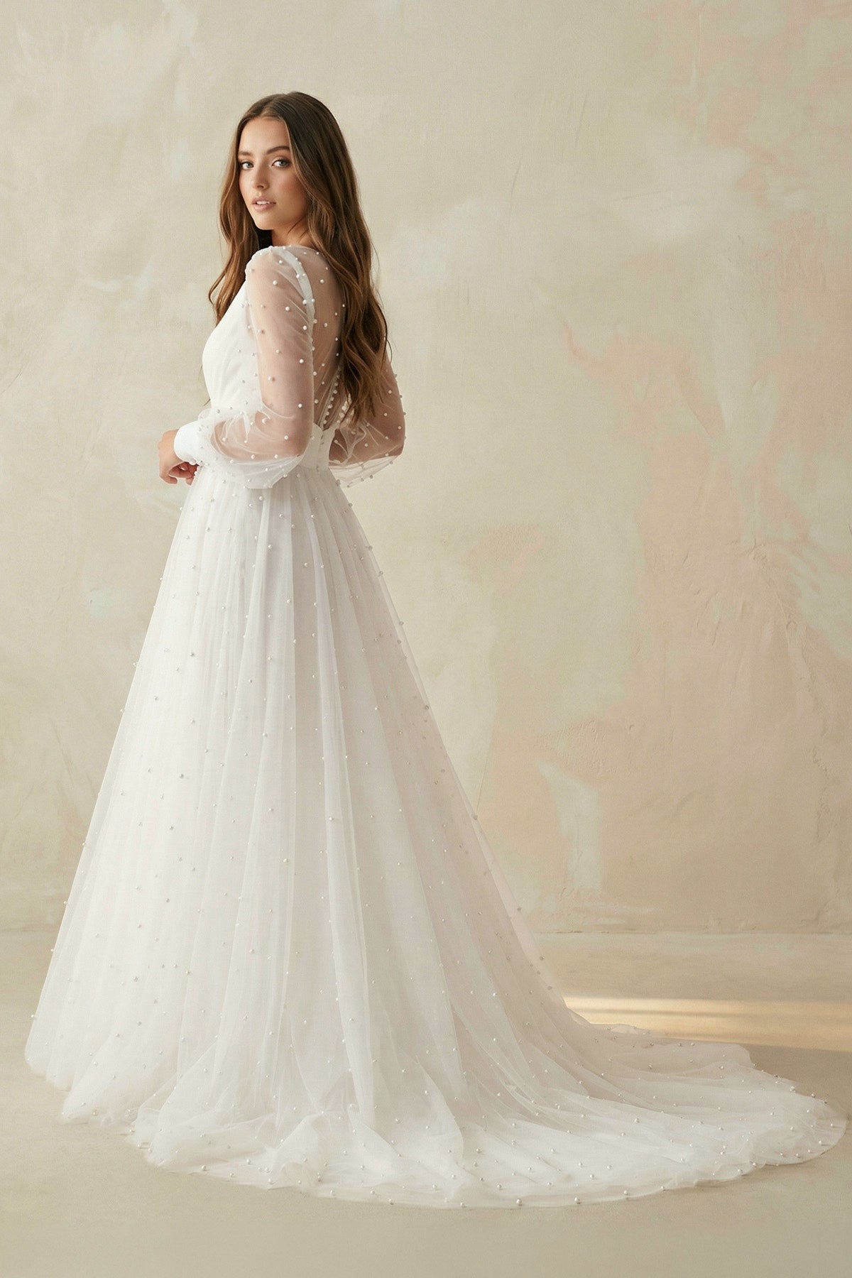 Robe de mariée ivoire trapèze en tulle à col V manches longues - Harana