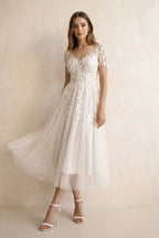 Robe de mariée ivoire trapèze tulle col V manches courtes - Harana