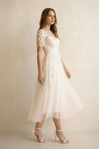 Robe de mariée ivoire trapèze tulle col V manches courtes - Harana