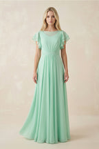 Robe demoiselle d’honneur pale pistachio longue effet drapé à volants en mousseline - Harana