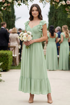 Robe demoiselle d’honneur vert sauge midi plissée effet drapé à volants - Harana