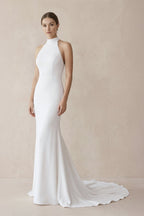 Robe de mariée blanche satinée coupe sirène à col licou ornée de perles - Harana