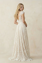 Robe de mariée ivoire trapèze en dentelle effet illusion - Harana