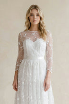 Robe de mariée blanche trapèze en dentelle manches longues effet illusion - Harana