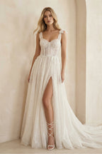 Robe de mariée ivoire en tulle coupe trapèze ornée de sequins avec fente - Harana