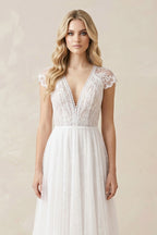 Robe de mariée blanche en tulle et dentelle coupe trapèze à col V et manches courtes - Harana