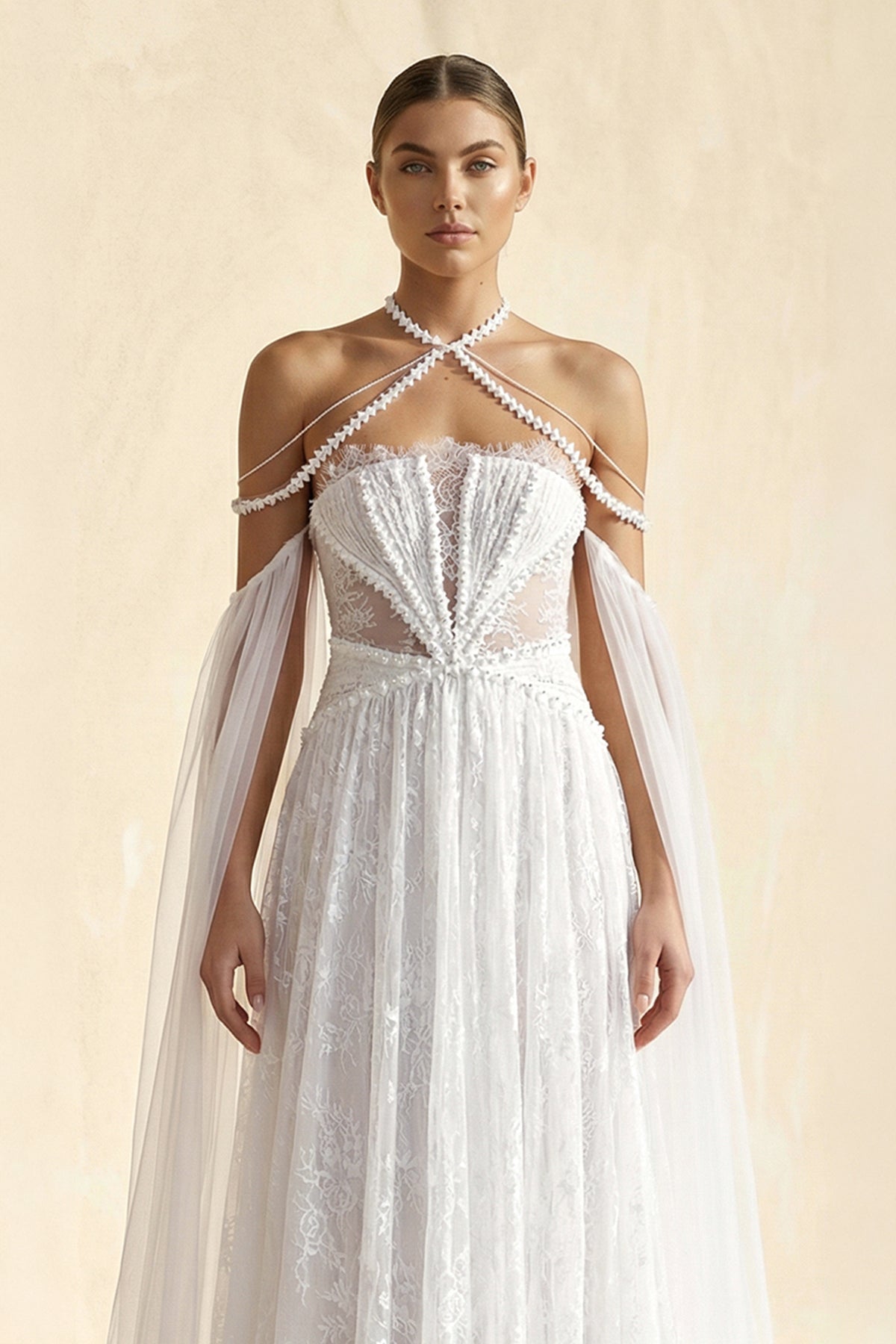 Robe de mariée ivoire trapèze en dentelle à épaules dénudées manches longues - Harana