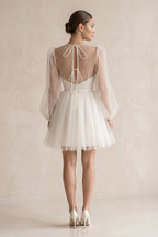 Robe de mariée blanche trapèze en dentelle manches longues effet illusion - Harana