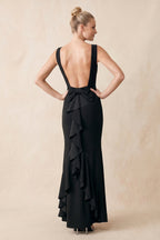 Robe noire longue satinée coupe fourreau à encolure bateau ornée de volants avec nœud - Harana