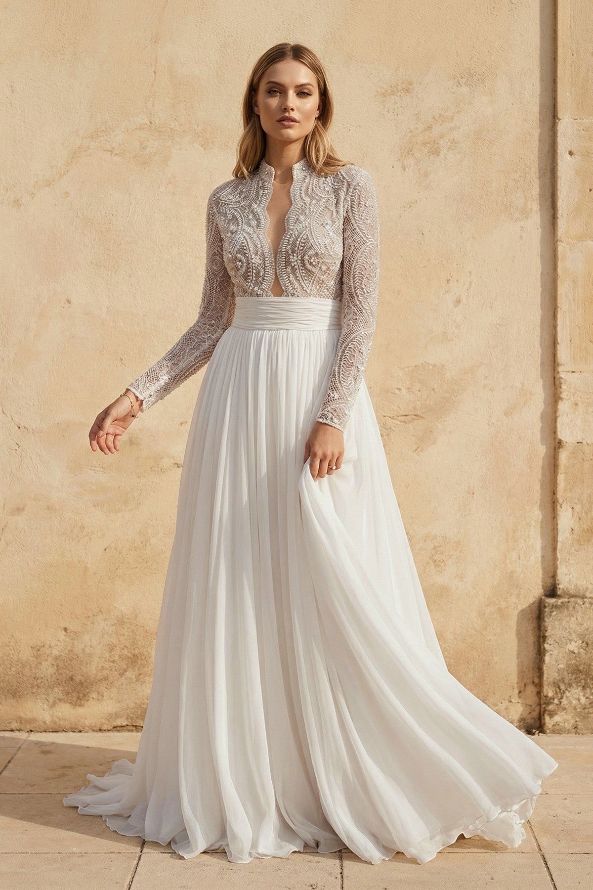 Robe de mariée blanche et nude trapèze en mousseline manches longues perlée - Harana
