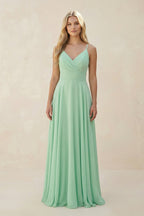 Robe demoiselle d’honneur pale pistachio longue à fines bretelles sans manches froncée - Harana