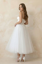 Robe de mariée blanche midi trapèze dentelle à fines bretelles décolleté cœur - Harana