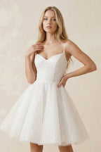 Robe de mariée blanche courte en tulle coupe trapèze à fines bretelles - Harana