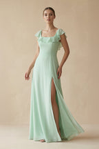 Robe demoiselle d’honneur pale pistachio longue sans manches avec fente effet drapé - Harana