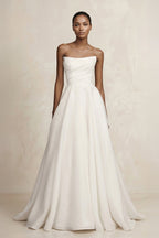 Robe de mariée ivoire trapèze en satin bustier manches longues - Harana