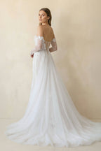 Robe de mariée ivoire en tulle coupe sirène bustier ornée de détails floraux - Harana