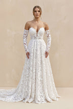 Robe de mariée ivoire trapèze en dentelle décolleté cœur manches longues - Harana