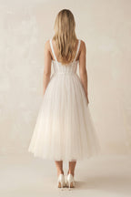 Robe de mariée ivoire trapèze en tulle décolleté cœur sans manches - Harana