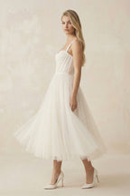 Robe de mariée ivoire trapèze en tulle décolleté cœur sans manches - Harana