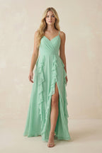 Robe demoiselle d’honneur pale pistachio longue à fines bretelles sans manches avec fente - Harana