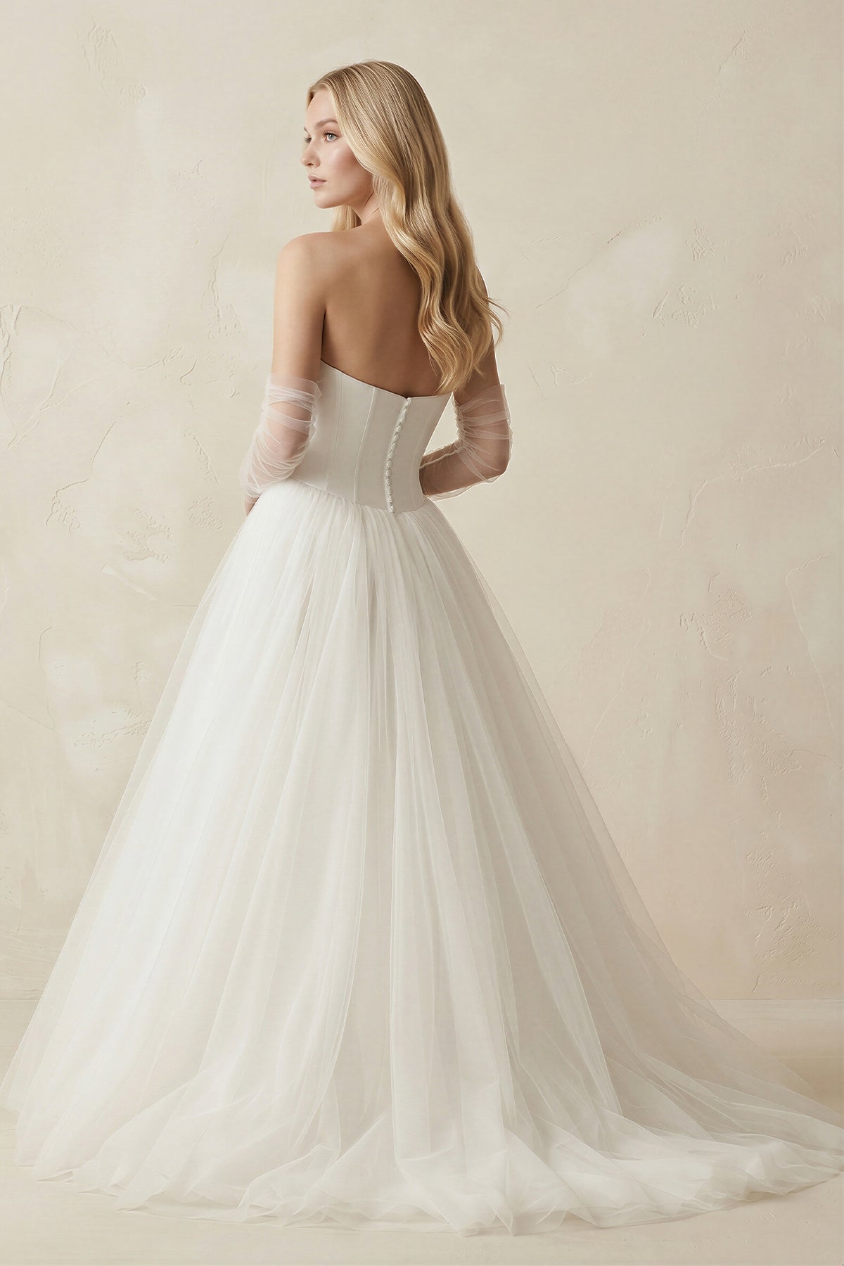 Robe de mariée ivoire longue bustier manches longues froncée - Harana