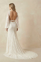 Robe de mariée ivoire en dentelle coupe sirène à col V et manches longues dos nu - Harana