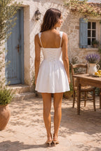 Robe blanche courte en coton coupe trapèze ornée de volants - Harana