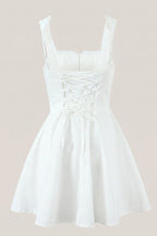 Robe blanche courte en coton coupe trapèze ornée de volants - Harana